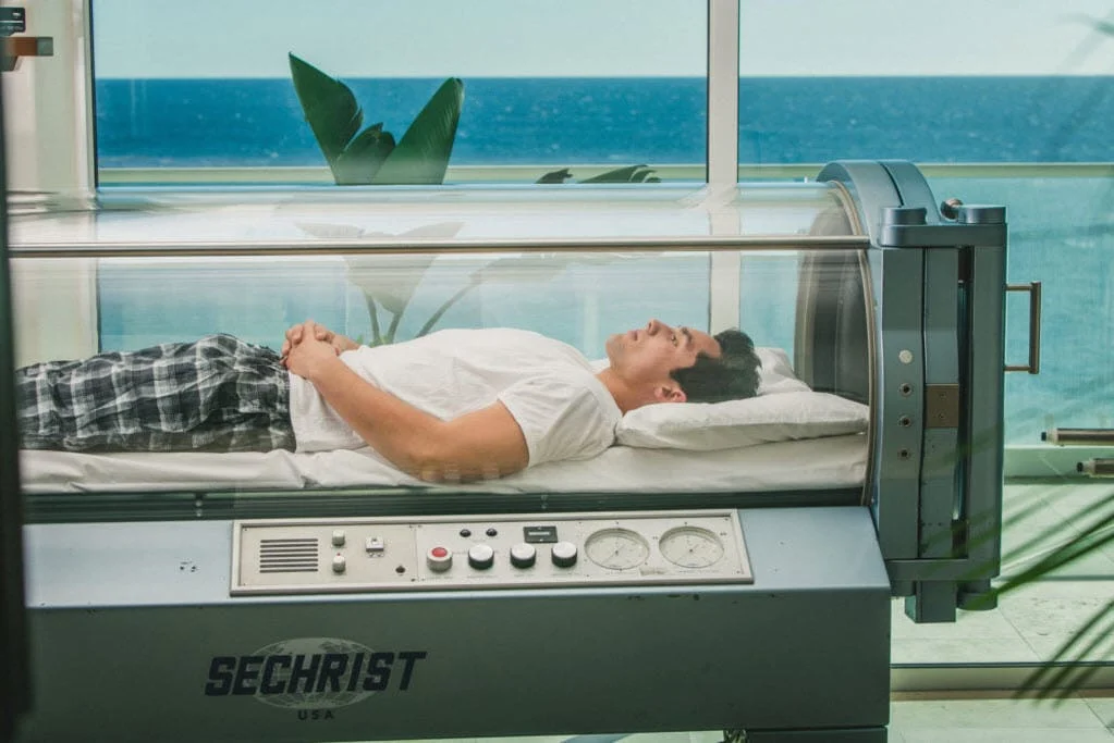 man in hyperbaric chamber