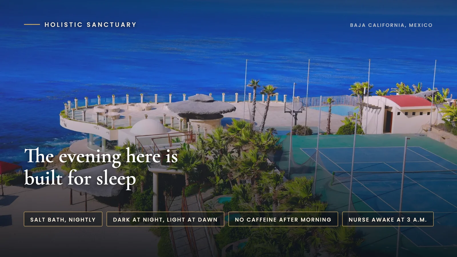Infographic over the oceanfront facility terrace and pools at Holistic Sanctuary in Baja California, Mexico, stating that the evening here is built for sleep, with labels for a nightly salt bath, dark at night and light at dawn, no caffeine after morning, and a nurse awake at 3 a.m.